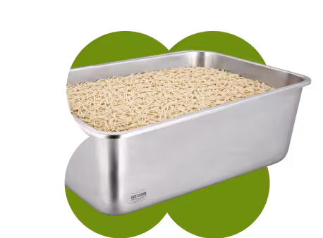 Metal litter box filled with pellet litter